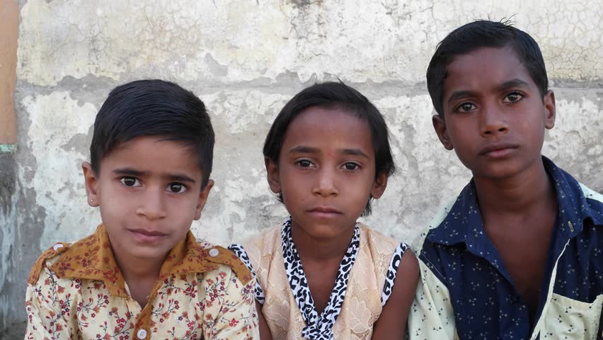 India kid. Indian Kids sitting.