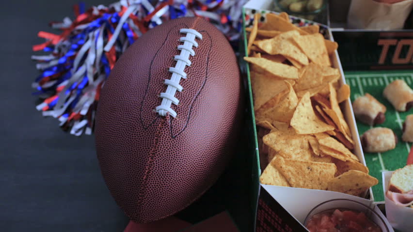 Football Snack Stadium filled with sub sandwiches, veggies and chips.