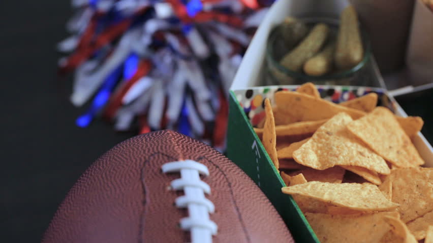 Football Snack Stadium filled with sub sandwiches, veggies and chips.