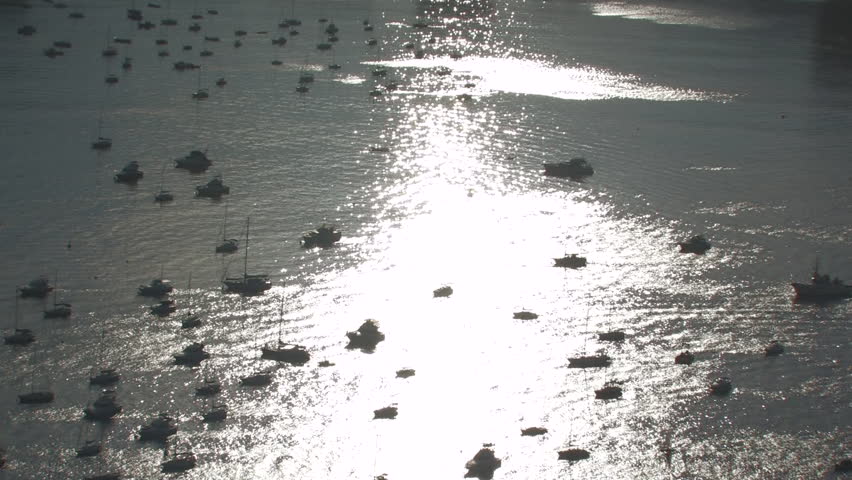Sunset over ocean bay full of boats in Rio de Janeiro