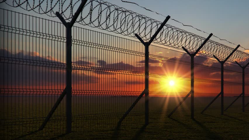 boundary fence on sunset animation looped Royalty-Free Stock Footage #21882751