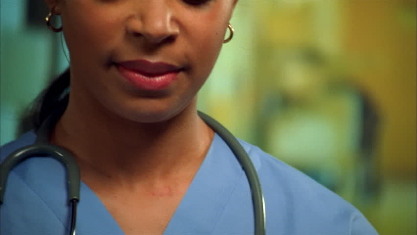 Closeup of portrait of african american nurse in hospital