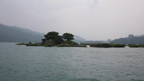 The smallest island, Lalu island, in Sun Moon lake in Taiwan.