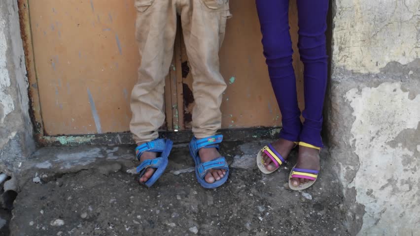 Indian kids talking on cell phone mobile, all excited and happy 