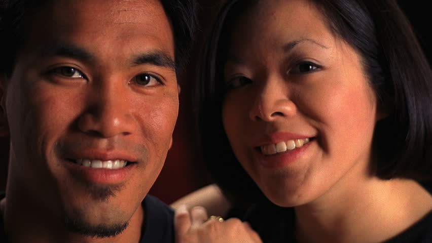 Closeup of happy Asian couple