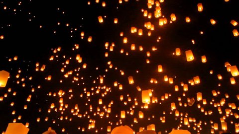 Release floating lanterns to the sky , Yi Peng Lantern festival, Chiang Mai, Thailand.