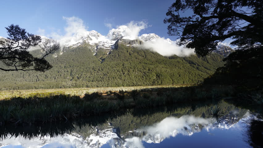 Clean and clear lake with reflection at Mirror Lake, New Zealand