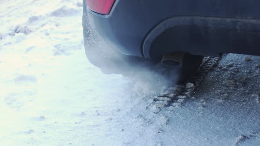 Video of Exhaust pipe of car with clouds of smoke on winter road | Shutterstock HD Video #21925357