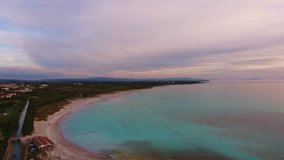 Aerial shot,  incredibly beautiful calm sea in the sunset light with lots of clouds,  marvellous white beach created because of water pollution  with beautiful clouds and calm sea, filmed with drone