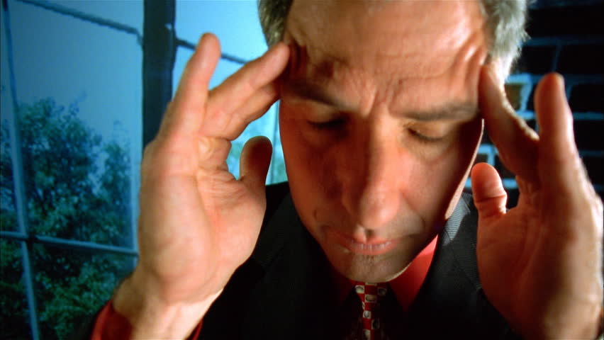 Tension headache for businessman