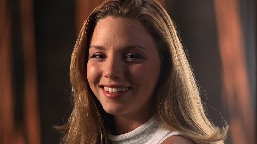 Smiling young blonde woman