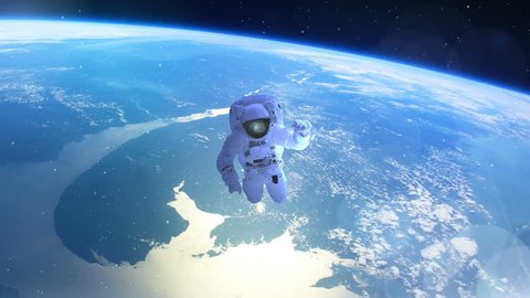 Astronaut above the earth in open space Adlı Stok Video