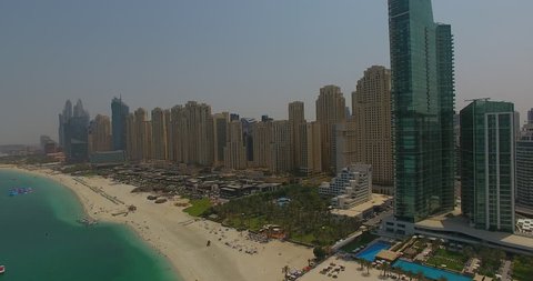 Aerial view by drone in Dubai looking at the beach and main resort hub.