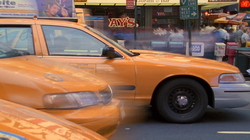 New York City, NY - CIRCA 2003: (Timelapse View) Stop and go traffic on 42nd St.
