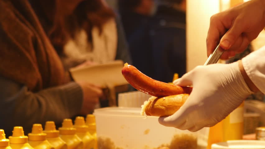 Grilling sausages and making hot dogs
