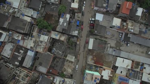 Favela Aerial: God's eye view looking down over street and favela houses in Rio de Janeiro, Brasil