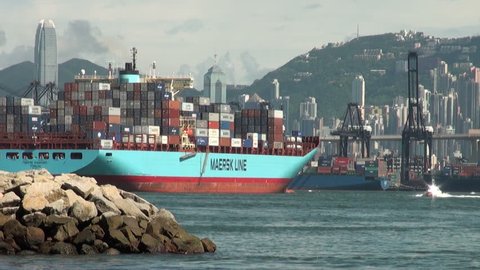 HONG KONG - 27 JULY: A container ship leaves the port of Hong Kong on July 27, 2010.