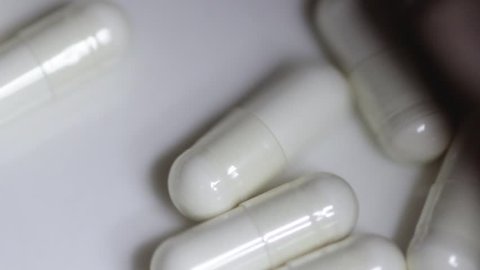 White Pill Tablet Capsule Vitamin B6 spinning