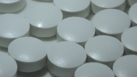 White Circular Tablet Pills Spinning 