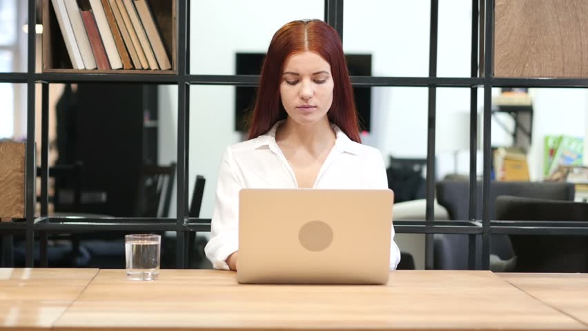 Young Girl Working on Laptop
