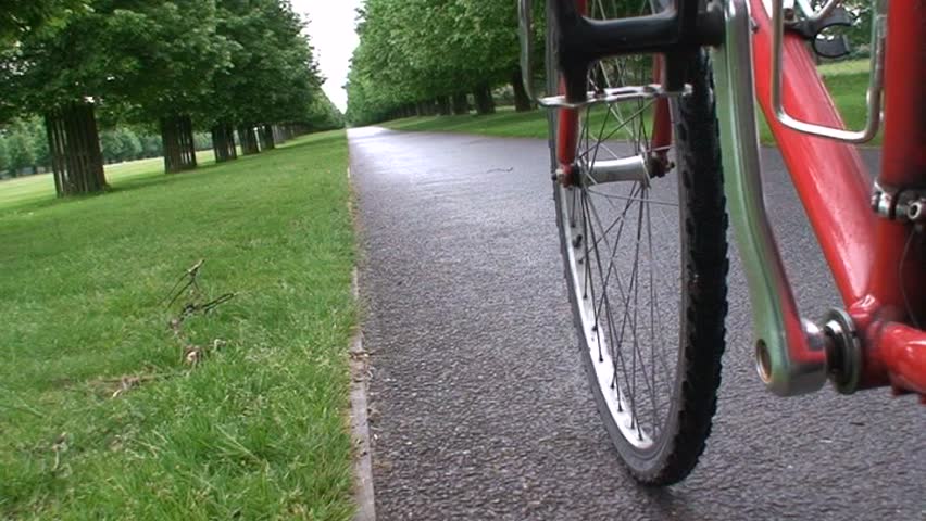 Cycling along a park path