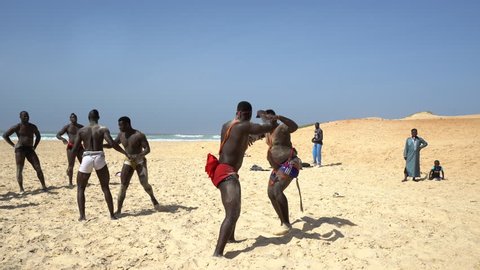 Senegalese wrestling on the beach - Traditional African sport - 2016 April: Dakar, Senegal