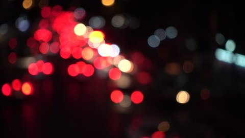 4K Bokeh of car lights. On the street at night Colorful Circles Video Background Loop Glassy circular shapes perform a colorful dance. motion background that is just perfectly suited for DVDs, events 
