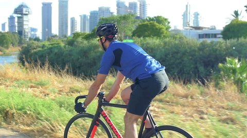 IZRAEL, TEL AVIV - 8 JUNE 2016: Active man bicyclist in the park