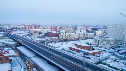 In Omsk winter night falls, the weather deteriorates. The flow of cars.