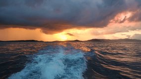 slow motion video of sunset shot on moving boat in the caribbean
