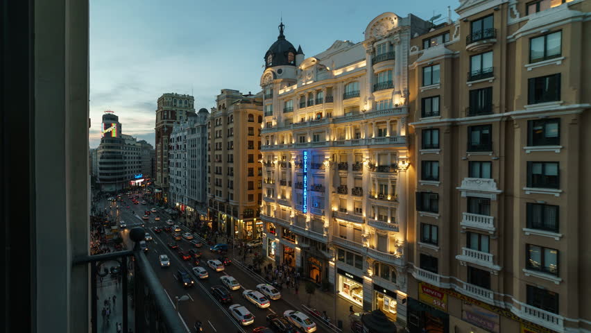 MADRID - OCTOBER, 2016. Blue hour of Gran Via street of Madrid. Time lapse shot from a hotel. Royalty-Free Stock Footage #22057501