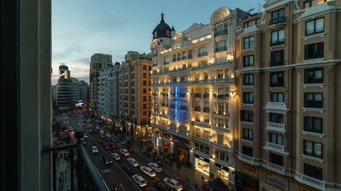 MADRID - OCTOBER, 2016. Blue hour of Gran Via street of Madrid. Time lapse shot from a hotel.