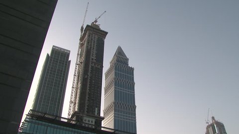 Dubai, UAE - circa 2009 - Low-angle view on a skyscraper under construction on sheikh zayed road, during the building boom in Dubai. (Dubai, UAE-2009)