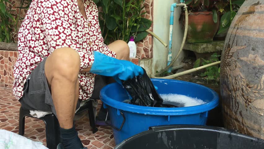 Woman sitting Washing

