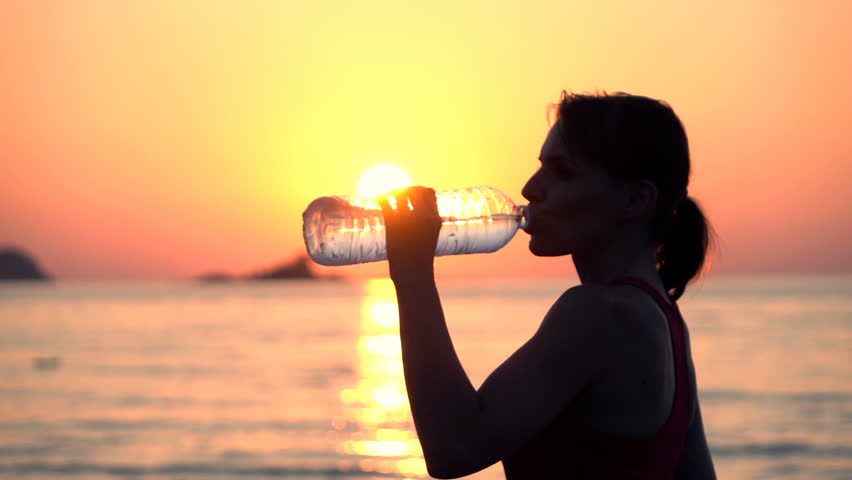 Sporty Woman Drinking Water After Stock Footage Video (100% Royalty-free)  22071655 | Shutterstock