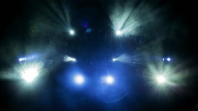 The light of searchlights in smoke on stage of the theatre. Footage, video