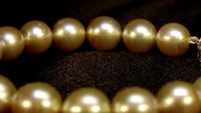 Smooth natural south sea pearl necklaces, studio macro, part 2