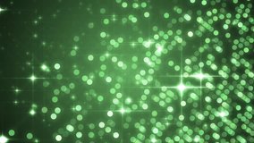 Green abstract background.Beautiful green background with flying particles. Green screen. Seamless loop.