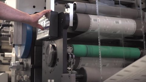 Label Printing Rolls with Man Controlling
