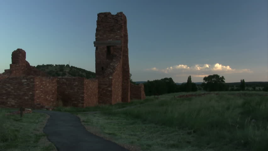 The sun emerges from the clouds to cast a pretty glow on Abo Ruins at Salinas Pueblo Missions National Monument.