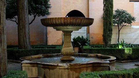 Water font in the medieval city of Alhambra, Granada, Spain.