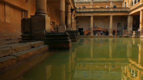 A low angle shot of the famous spa thermal complex in the city of Bath, England, UK. The temple was established in 60-70 AD and the bathing complex was gradually built up over the following 300 years