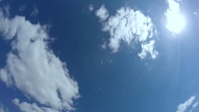 White clouds on a blue sky. Timelapse.