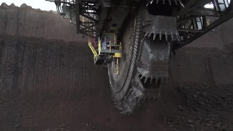 Heavy Mining Machine that Extracts Coal Bucket Wheel Excavator Aerial Drone Long Shot Open Pit Mine
