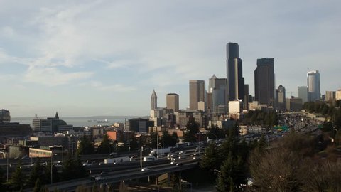 A complete day to night time lapse scene showing a tight angle on the Seattle skyline as seen from the south.