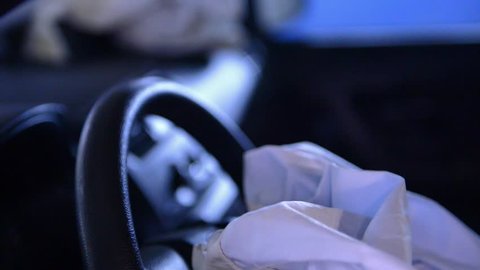 A driver-side airbag on the wheel after a car accident. Panorama