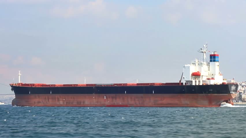 Tanker ship sails in the sea. Side view of the oil tanker.  
