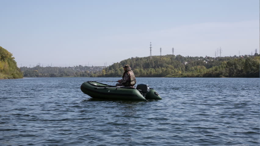 Fisherman fishing on boat

