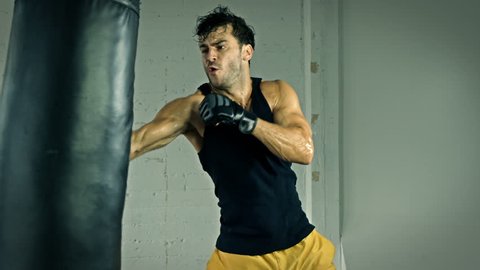 Athletic Male Working Out. Boxing. Slow Motion.