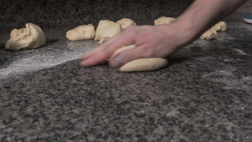 Making little round balls of dough with soft hands | Shutterstock HD Video #22212748